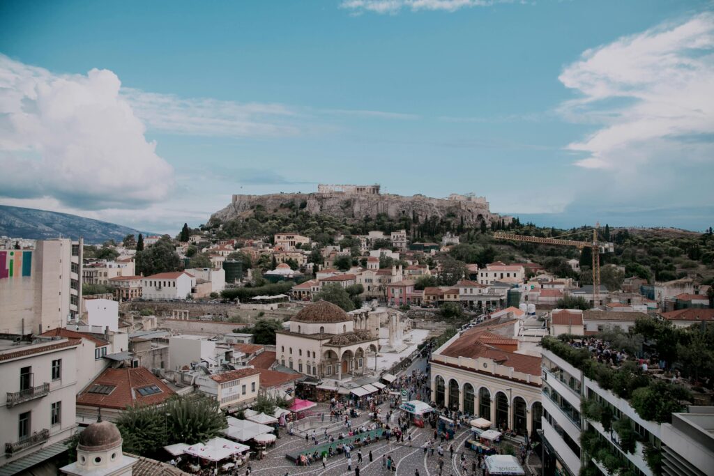 Brown and White Concrete Buildings in Athens Greece. Photo by: Jimmy Teoh