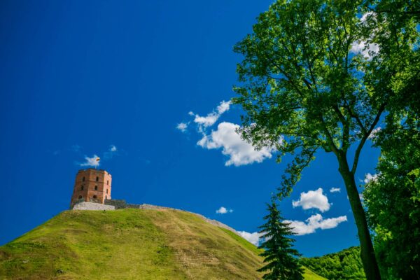 Looking up at Gediminas Tower in Vilnius on a sunny day.