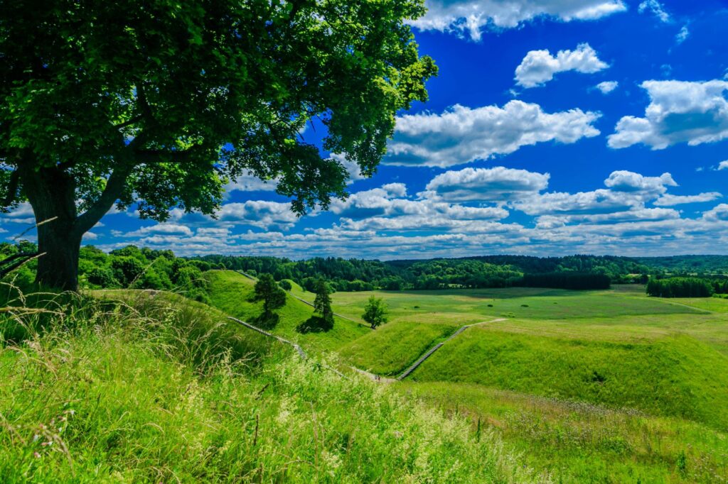 Hill forts of Kernave on a sunny day with some clouds in the sky