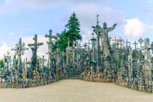 Hill of Crosses in Lithuania on a hot summer day with blue skies.