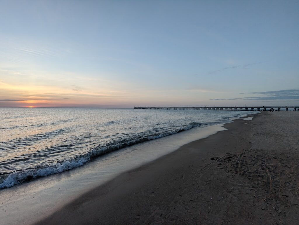 Palanga beacch at sunset looking onto the pier.