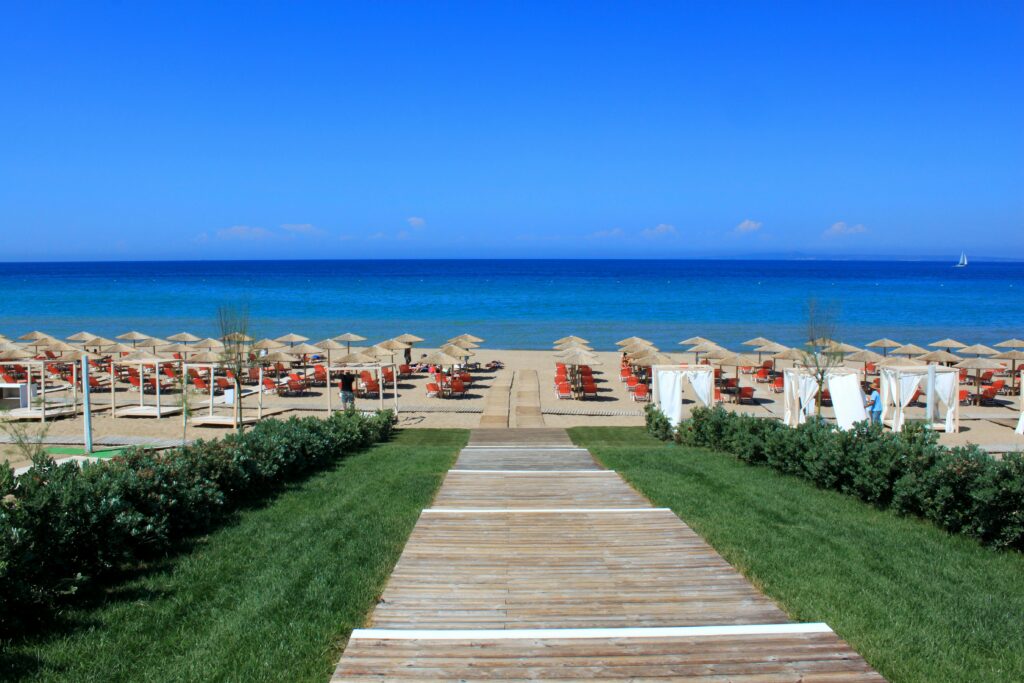 Brown Wooden Pathway Near Body of Water in Zakinthos Greece